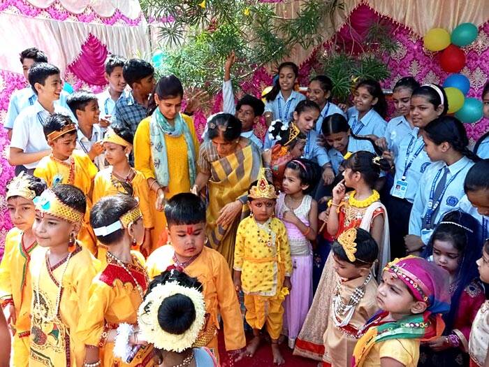 Children in festive costumes at a school cultural celebration